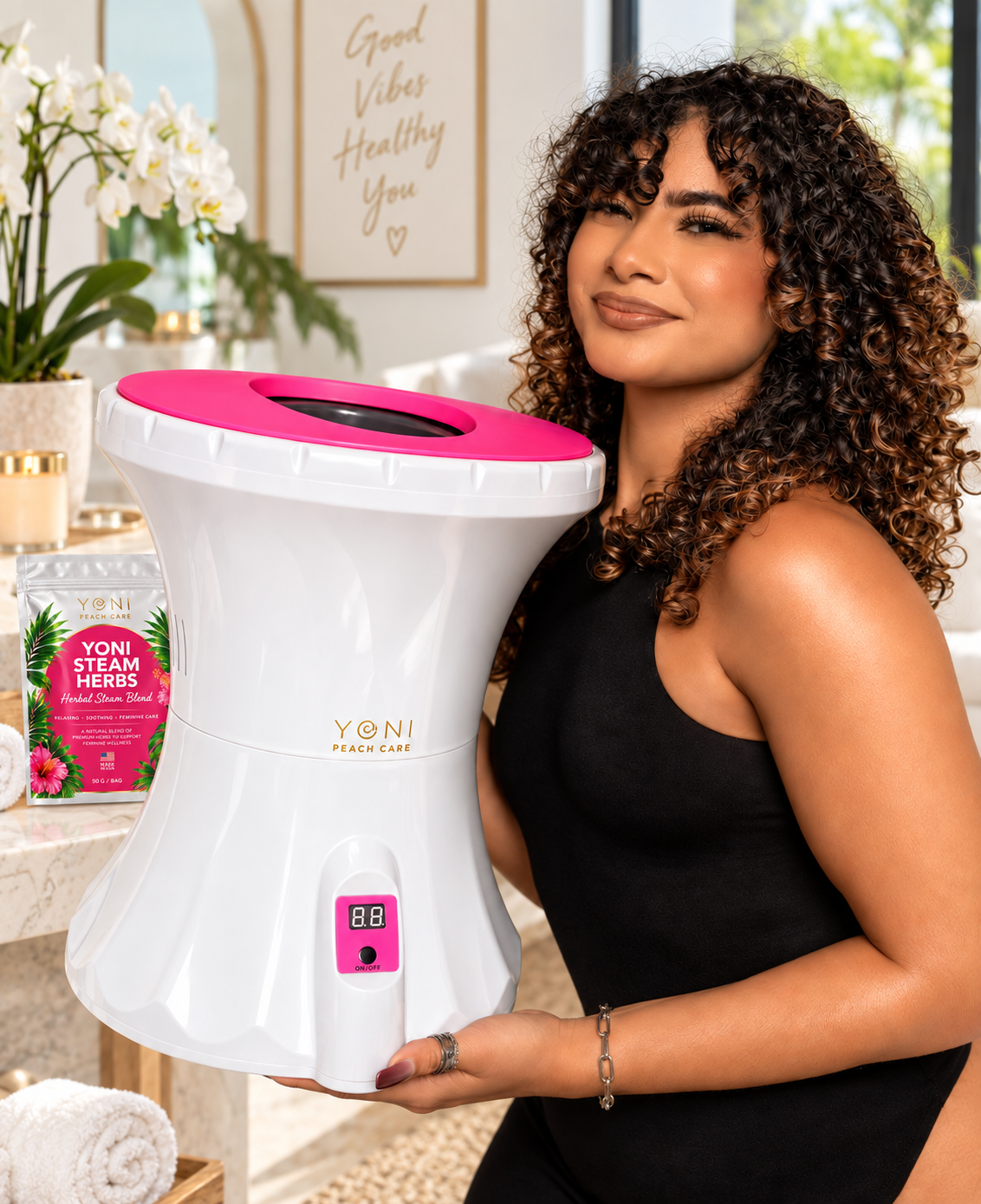 Woman holding the Rejuvenating V-Pot steamer beside a Yoni Steam Herbs pouch