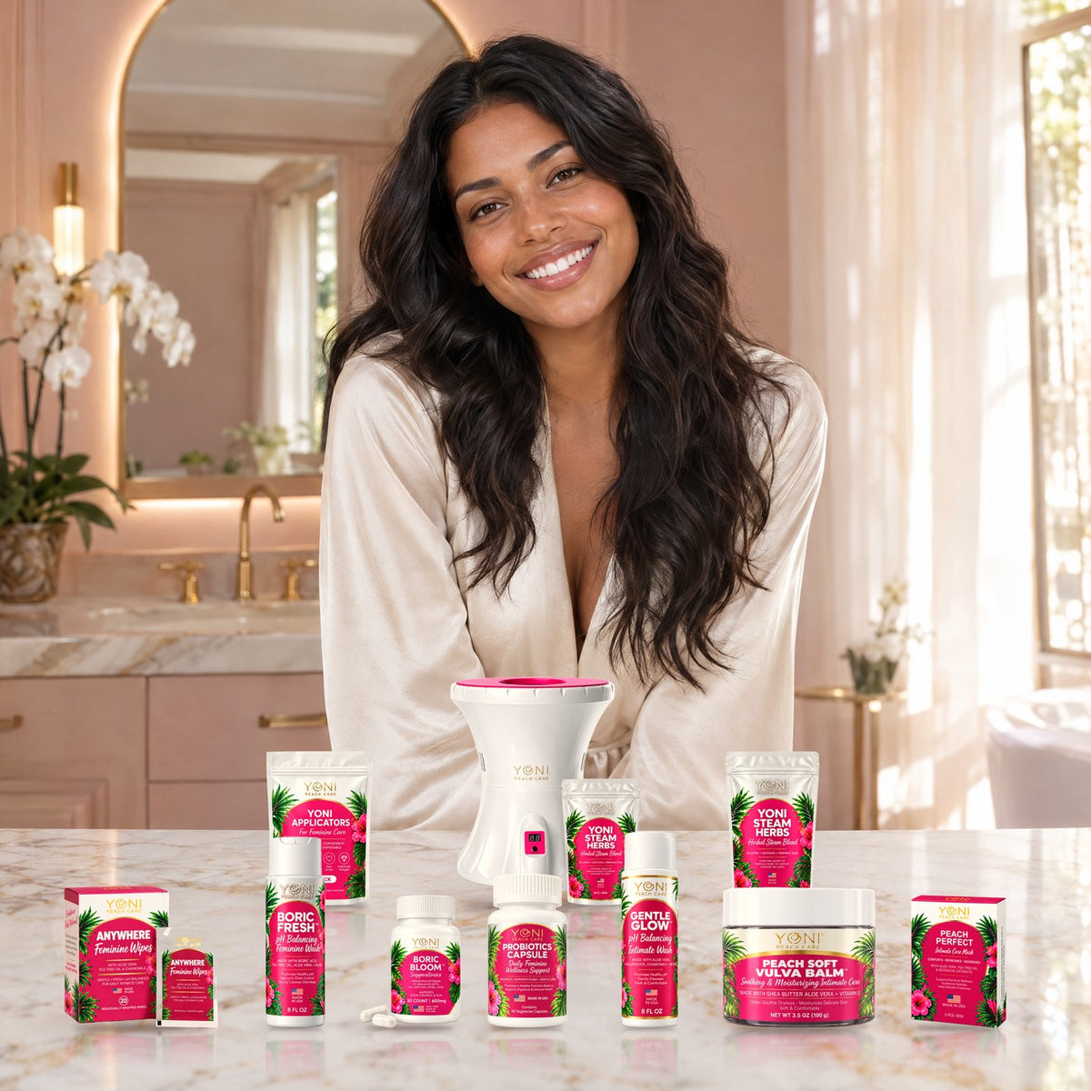 Smiling woman in a luxury bathroom with the full Yoni Peach Care product collection on a marble counter
